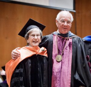Honorary degree awardee Virginia Slaughter with CUNY Chancellor Matthew Goldstein at commencement for the Macaulay class of 2013.